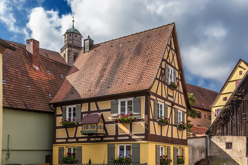 Obraz premium Dinkelsbühl, Germany. Half-timbered house, decorated with a small copy of itself