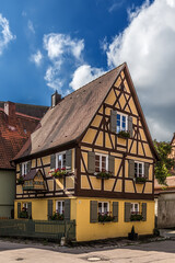 Dinkelsbühl, Germany. Beautiful half-timbered house, decorated with a small copy of itself