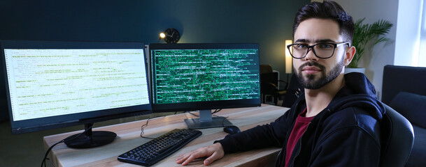 Programmer working in office late in evening