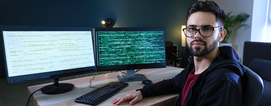 Programmer working in office late in evening