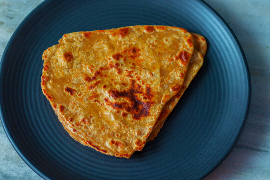 selective focus of popular Indian bread "paratha".