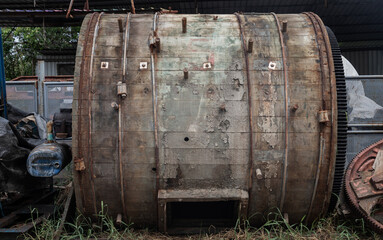 Antique old large wooden barrels for the tanning of cattle leather was left to deteriorate over...
