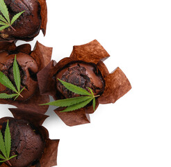 Chocolate cannabis muffins with leaves on white background, closeup