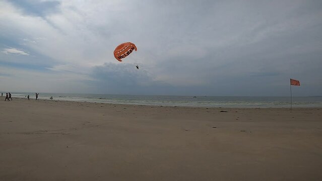 Paragliding on the beach, parasailing on the beach