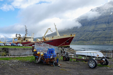 Fishing boat moored in the port of Eskifjörður, Iceland.