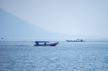 The Beauty of Jati Luhur Dam at Purwakarta Regency, West Java, Indonesia. Sunset over the lake.
