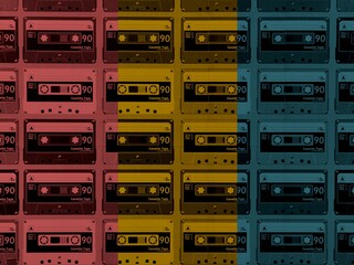 pop-art style colourful collection of C90 tape cassettes from the 1980's