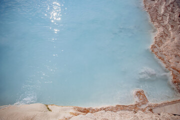 Cleopatra pool Natural travertine with blue water in Pamukkale Turkey