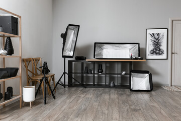 Different modern equipment in stylish photo studio interior
