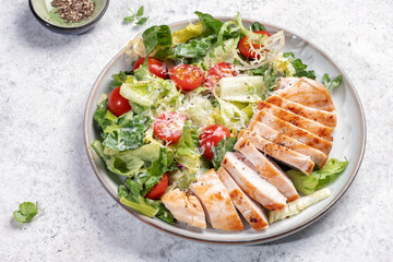 Green salad with grilled chicken breast. Healthy food, clean eating concept