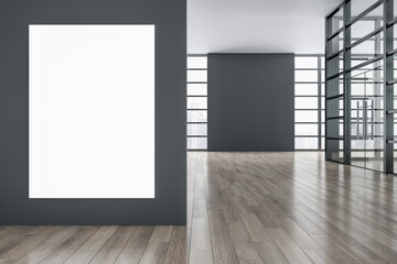 Modern exhibition interior with wooden parquet flooring, reflections, panoramic window frame and city view, daylight and blannk white mock up banner on wall. Gallery and museum concept. 3D Rendering.