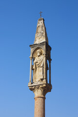 Fototapeta na wymiar A column with a saint near Piazza Bra in Verona, Italy 