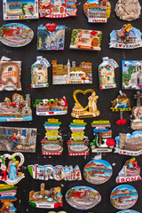 Showcase with funny magnets with pictures of Romeo and Juliet, Verona, Italy