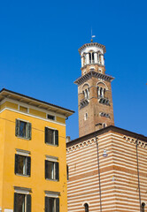 Fototapeta na wymiar Lamberti Tower on the Piazza delle Erbe in Verona, Italy