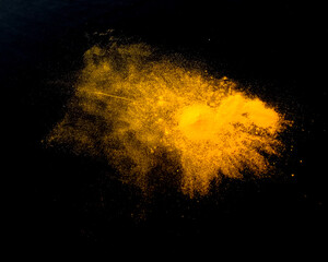 Powder explosion isolated on Dark background. dust particles splash. Powder Explosion dust explodes Holy Festival.