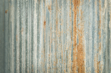 Old zinc wall texture background, rusty on galvanized metal panel sheeting.