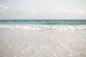 Wave on Sand beach with blue sea and blue sky and white cloud beautiful at coast. beautiful blue ocean shore outdoor nature landscape water  background. tourist summer travel holidays tropical season.