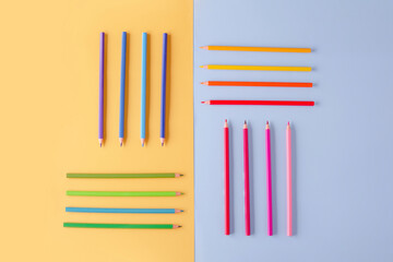 a few colored pencils on a yellow-blue background Develop creativity