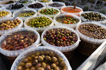 Pickled olives of different varieties at the bazaar.