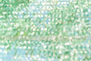 Abstract blur bokeh with green leaf texture background