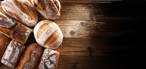 Composition with assorted bakery products on wooden table