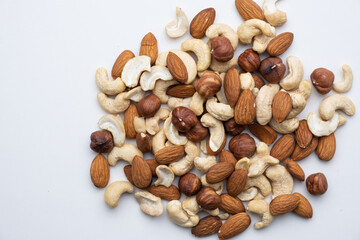 Various nuts on a white background close-up.