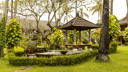 Beautiful garden in Legian beach villa, green lush garden in Bali, Indonesia