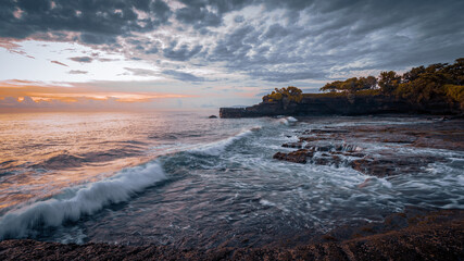 Breathtaking sunset in Bali near Tanah Lot temple, Indonesia