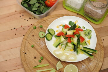 Summer salad on kitchen cooking table,