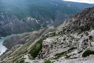 Fototapeta premium panoramic view of the mountains and gorges on a spring sunny day