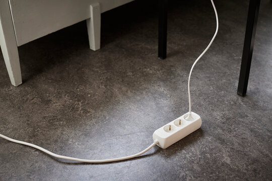 Electric extension with plug