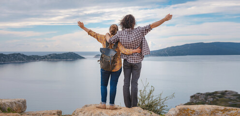 Couple traveler explore ruins castle of Simena with view of sea bay and Kekova Island with famous...