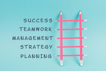 Ladder of success build with pencils, planning a strategy, teamwork for success step by step concept, progress in business and education, have a goal