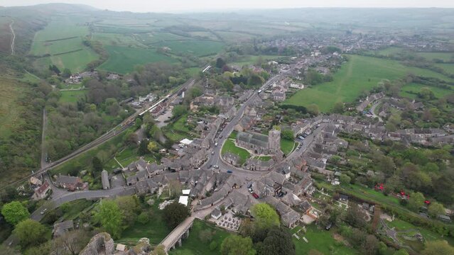 Corfe Village rising drone aerial view Dorset England
