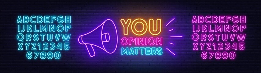 Your opinion matters with a megaphone neon sign on brick wall background.