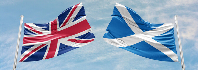 United Kingdom flags. The Union Flag and Scottish Saltire fly together during - obrazy, fototapety, plakaty