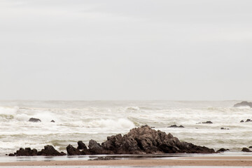 rock formation on the coast of the basque country on the sopelana beach