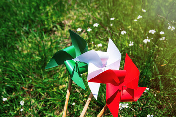 paper windmill in italian flag color, national Italy background	
