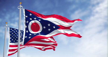 The Ohio state flag waving along with the national flag of the United States of America