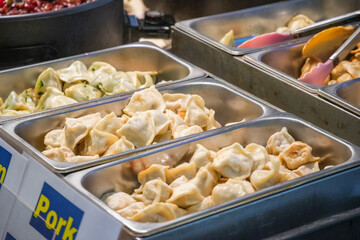 Chinese pan fried dumplings on display at Brick Lane Market in London