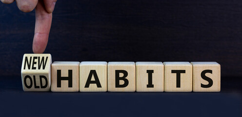 New or old habits symbol. Turned wooden cubes and changed concept words Old habits to New habits....