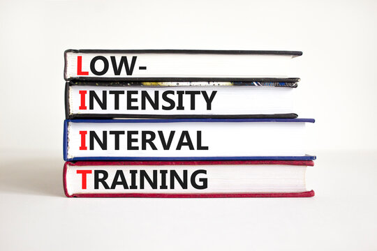 LIIT low-intensity interval training symbol. Concept words LIIT low-intensity interval training on books on a beautiful white background. LIIT low-intensity interval training concept. Copy space.