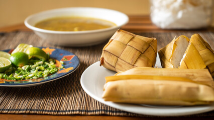 Rice cake (Ketupat) is Cooked Rice packed inside a diamond-shaped container of woven palm leaf pouch for Moslem Celebration. Eid Mubarak concept. Indonesian traditional food.