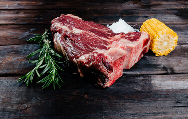 steak on dark wooden background pork beef