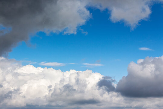 grey clouds on a blue sky. calm nature background. weather change before the rain