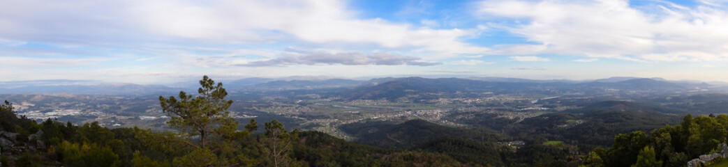 Obraz premium Panoramic view of the mountains of Galicia and Portugal from the forest park Monte Alba. Spain
