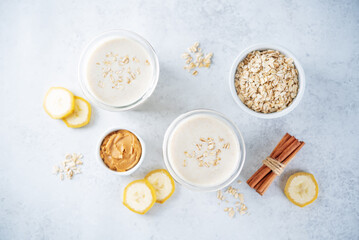 Peanut butter oats banana smoothie in a glass