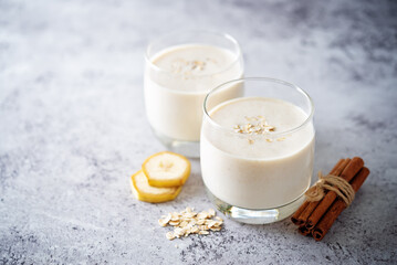 Peanut butter oats banana smoothie in a glass