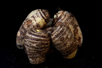 Taro Root, Pani Kachu, group isolated in extendable black background, studio lighting, macro, tropical food, healthy food, 
