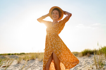 stylish attractive slim smiling woman on beach in summer style fashion trend outfit